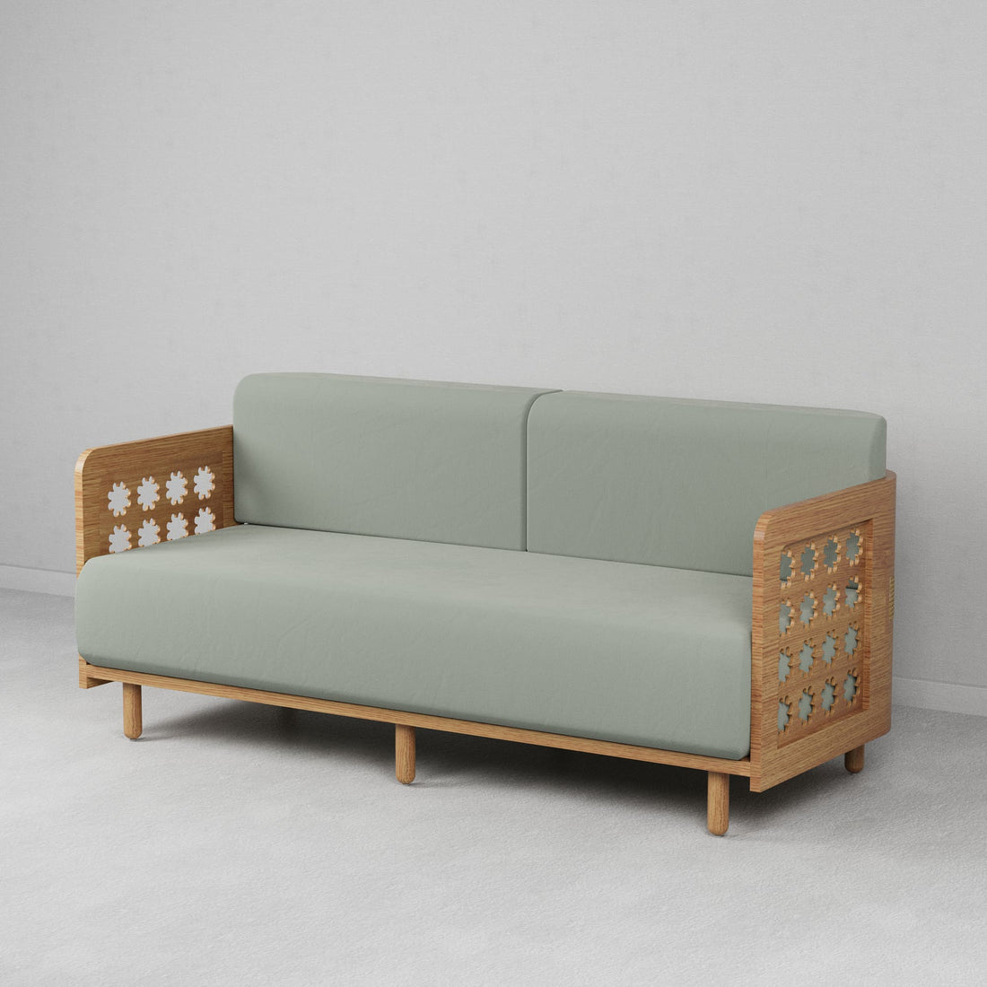 A beige 3-seater sofa with wooden side tables featuring cut-out floral patterns and a cushioned backrest and seat.